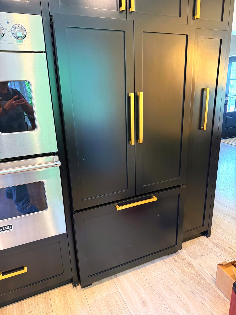 Panel-ready built-in French door refrigerator in a modern home kitchen — Appliance Rescue Team serves Tenafly, NJ
