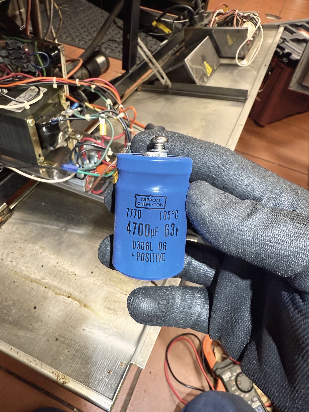 The failed capacitor. On a machine this size, this is the part that stopped the pan from tilting