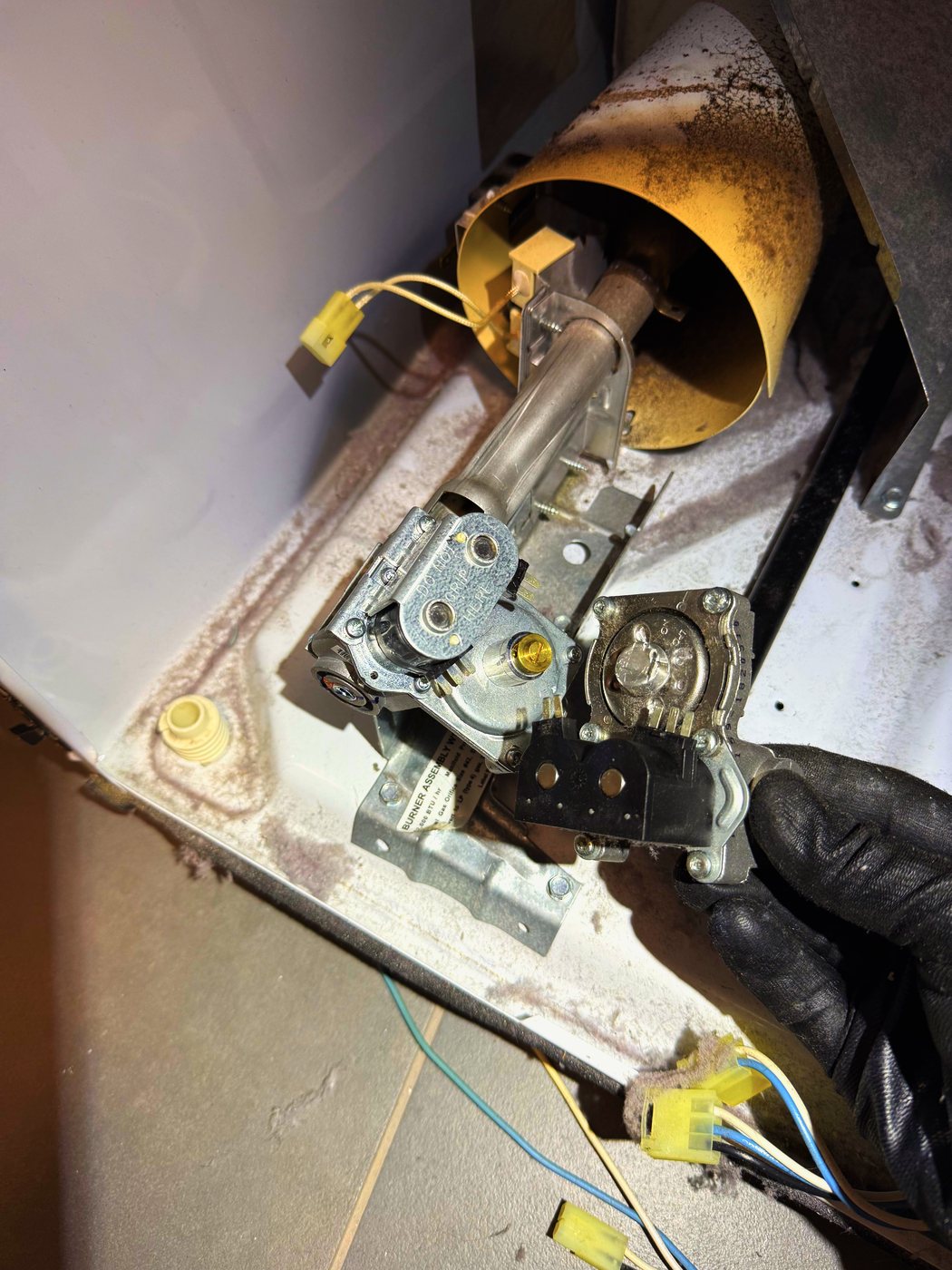 The valve assembly out. Replaced complete rather than patched — this is not a part to take chances with