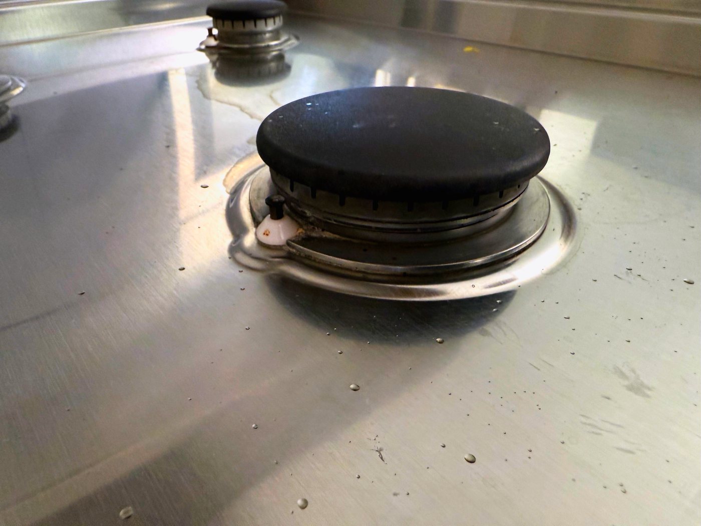 Back together and lighting on the first click, every burner watched after the knob was released