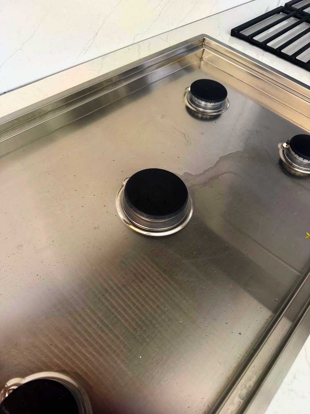 The Wolf cooktop this repair was done on — sealed burners, and most of them would not stay lit